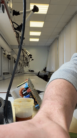 Electronics repair work documented in Perm laboratory early morning
