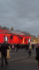 Crowd gathers at illuminated Winter Palace event in Saint Petersburg