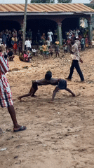 Traditional wrestling and dancing draws crowds in Nigerian villages