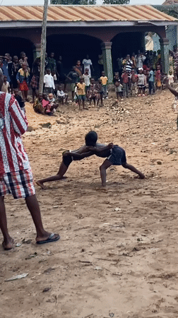 Traditional wrestling and dancing draws crowds in Nigerian villages