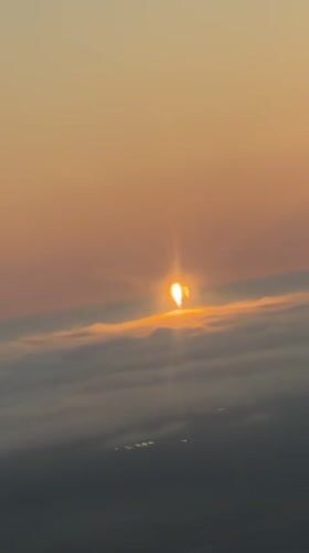 Above-cloud sunrise over California's central coast
