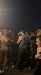 Nighttime dancing at an outdoor venue in Baku