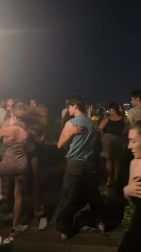 Nighttime dancing at an outdoor venue in Baku