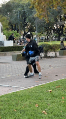 Two men boxing in Buenos Aires park