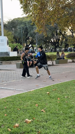 Two men boxing in Buenos Aires park