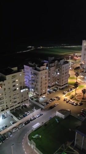 Evening scenes captured from Bat Yam balconies and interiors
