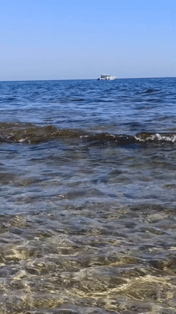 Lazy August morning at a rocky Molfetta beach and seaside trattoria