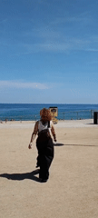 Beach visitors spotted with gear on Barcelona sand