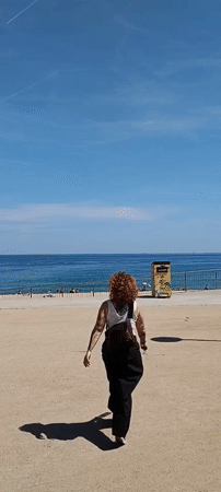 Beach visitors spotted with gear on Barcelona sand