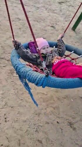 Families enjoy afternoon playground time in Tobolsk, Russia