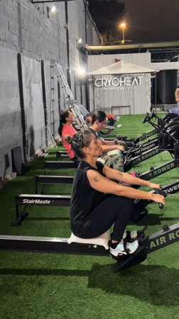 Indoor gym session in Arica, Chile: rowing, lunges, and recovery