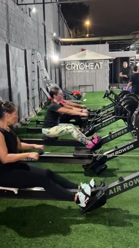 Indoor gym session in Arica, Chile: rowing, lunges, and recovery