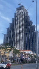 Everyday street life documented in Pattaya during construction boom