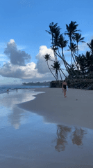Quiet afternoon walk along a Sri Lankan tropical beach