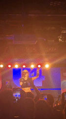 Female singer performs to crowd in Vienna