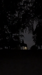 Horseback rider spotted in nighttime scene in Thailand