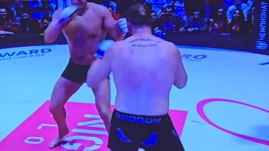 MMA fighters compete in indoor match in Putilkovo, Russia