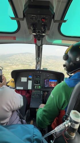 Helicopter cockpit flight documented near Changunarayan, Nepal