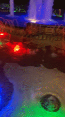Nighttime scenes documented in Alanya, Turkey include fountain display