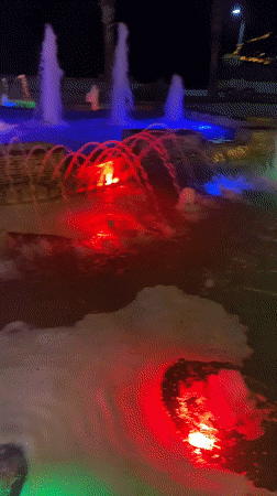 Nighttime scenes documented in Alanya, Turkey include fountain display