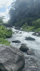 Whitewater rafting prep on a wild river in Selat