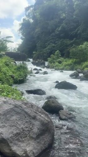 Whitewater rafting prep on a wild river in Selat