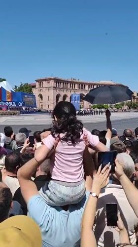 Crowd gathers in Yerevan to watch parade on outdoor screen