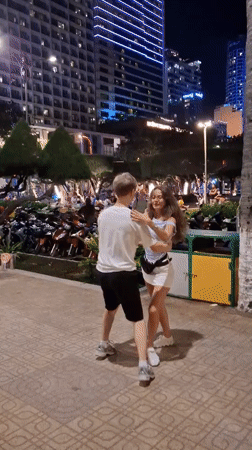 Nighttime street dancing in a Nha Trang public square