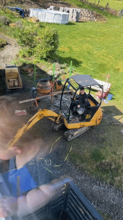 Excavator construction work observed in German residential backyards