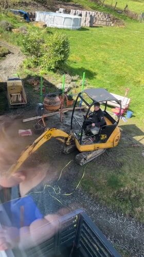 Excavator construction work observed in German residential backyards