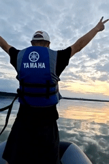 Sunset on the Kama River, boat trip and industrial skyline