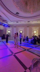 Ballroom dancing observed during social gathering, party invitation documented