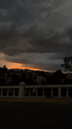 Dawn sky displays orange streaks over Mexico City