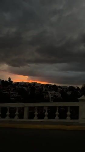 Dawn sky displays orange streaks over Mexico City