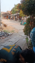 Neighborhood life in Jobokuto, Indonesia on a quiet morning