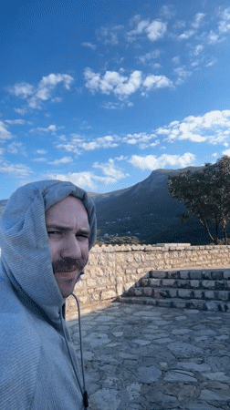 Dogs, stone paths, and a slow morning at Sveti Stefan
