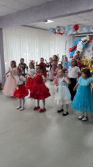 Children perform in formal celebration event