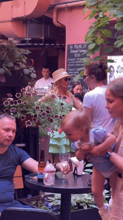 Lively courtyard bar party with DJ, dancing, and drinks in St. Petersburg