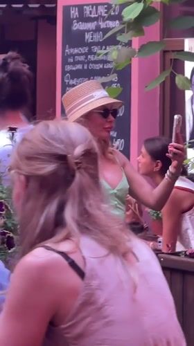 Lively courtyard bar party with DJ, dancing, and drinks in St. Petersburg