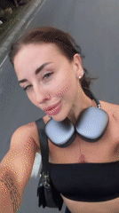 Woman Takes Selfie Video on Road in Mengwi