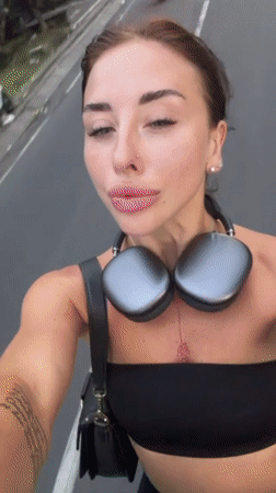 Woman Takes Selfie Video on Road in Mengwi