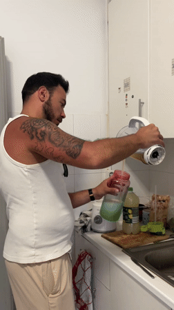 Kitchen blending and urban buildings documented in Lisbon evening