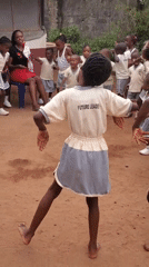 Nigerian school children participate in morning activities wearing "Future Leader" uniforms