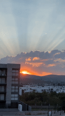 Sunset observed over Santa Clara Ocoyucan cityscape, Mexico