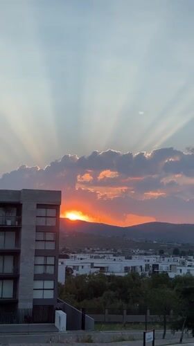 Sunset observed over Santa Clara Ocoyucan cityscape, Mexico
