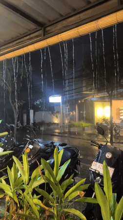 Heavy rainstorm documented at night in Mengwi, Indonesia