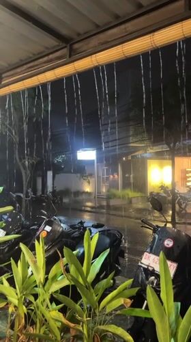 Heavy rainstorm documented at night in Mengwi, Indonesia