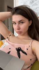 Woman photographed in pink top at Saint Petersburg home