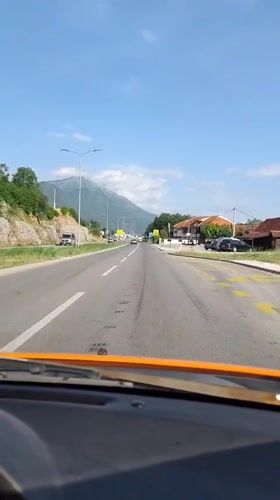 Morning drive through Montenegro captures roadside flowers and wildlife