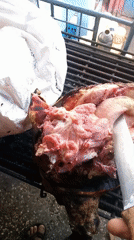 Early morning meat preparation on grill in Nairobi
